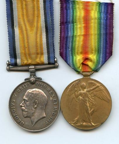 British War & Victory Medals Pair to Pte  Edward Woolls 2nd London Regiment