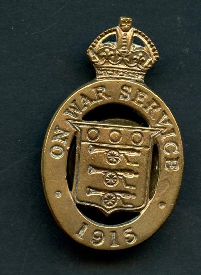 WW1 On War Service 1915 munition workers badge. ( Maker  J.R.Guant)