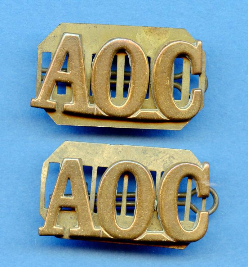 Pair of WW1 Army Ordnance Corps (A.O.C.) Shoulder Titles Badges