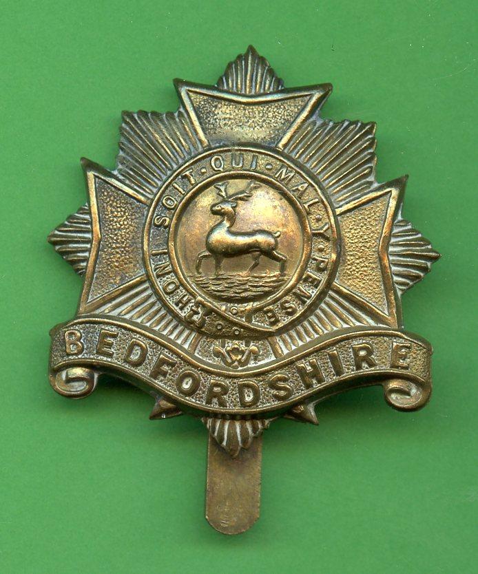 The Bedfordshire Regiment  WW1  Brass Metal Cap Badge